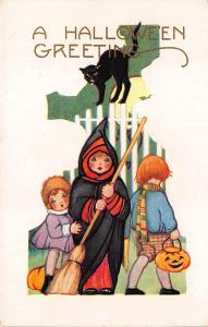Halloween Whitney Made Embossed  Costumed Children J-O-L Black Cat Postcard