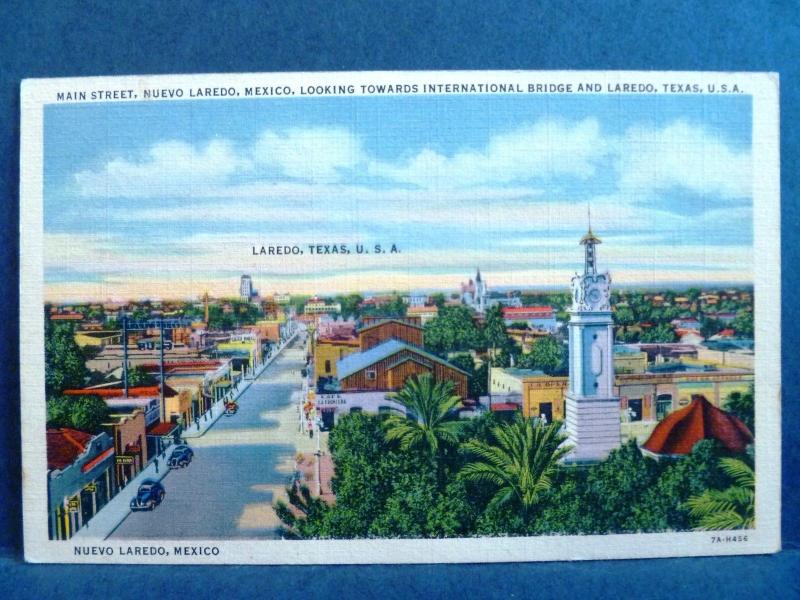 Postcard Mexico Main Street Nuevo Laredo Looking toward Laredo Texas