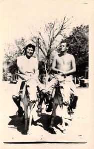 RPPC, Mexico  COUPLE POSING ON DONKEYS  Tourist Photo  ca1940's Postcard