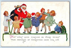 Christmas Postcard Santa Claus Sack Of Toys Childrens Scene Embossed c1910's