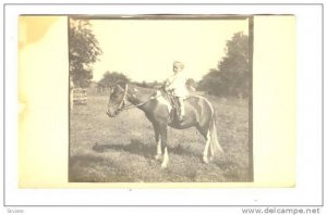 RP, Little Boy Riding On A Pony, 1900-1910s