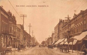 MAIN STREET LOOKING NORTH MAQUOKETA IOWA.POSTCARD (c. 1910)