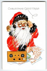 Santa Claus Christmas Postcard Saint Nick Using Ham Radio Writing Notes Embossed