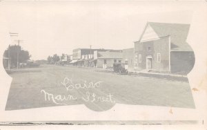 J42/ Cairo Illinois? RPPC Postcard c1910 Main Street Stores Automobile 43