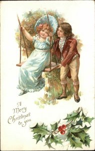 Nister No. 437 Christmas Victorian Boy Pushes Girl on Swing c1910 Postcard