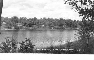 Lake George Michigan~Shoreside Homes on the Hills Beyond the Waters~RPPC 1950 