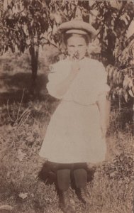 fashion rppc: Girl With Flower and Fall Wardrobe