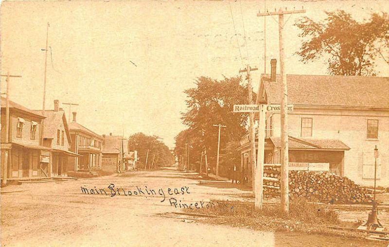 Princeton ME Main Street Store Fronts Railroad Crossing RPPC Postcard