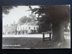 Gloucestershire STOW IN THE WOLDS The Elms shows VILLAGE STOCKS Old RP Postcard