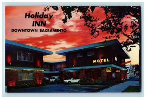 1950's Sunset Over Holiday Inn Sacramento, CA Postcard F84