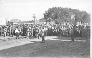 Postcard RPPC North Dakota Larimore 1940s Railroad crowd Oscar Bode 23-8345