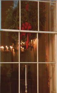 Vintage Postcard On Christmas Eve in a White House Window Candle Flame Light