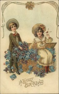Birthday - Children Golf Basket of Blue & Purple Flowers c1910 Postcard