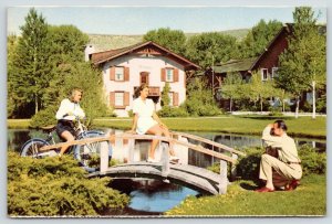 Sun Valley Idaho~Man With Camera Photo Shoot~Ladies on Bridge~Aspen~1940s Litho 