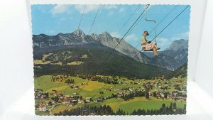 Vintage Postcard Lady using Chairlift in Seefeld Tirol The Swiss Alpes