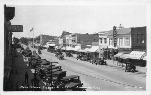 H89/ Longmont Colorado RPPC Postcard 1929 Main St Stores Business Autos150