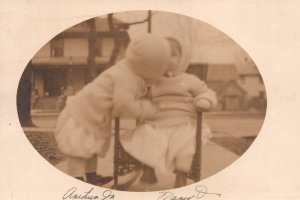 Postcard Young Girl & Boy Kissing Winter Coats Neighborhood Real Photo RPPC