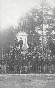 1911 Beverloo Belgium Soldiers Front of Monument Real Photo Postcard