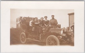 People in Automobile Early Car Quinlivan Blacksmith RPPC Postcard H80