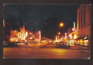 MISSOULA MONTANA DOWNTOWN STREET SCENE AT NIGHT CARS VINTAGE POSTCARD