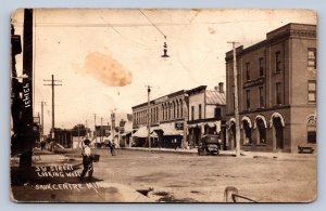 J90/ Sauk Centre Minnesota RPPC Postcard c1910 3rd Street Stores 575