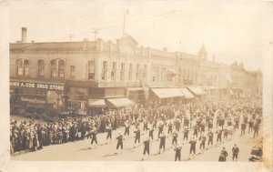 H57/ Oshkosh Wisconsin RPPC Postcard c1920s Parade Band Crowd 102