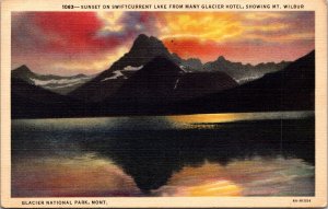 Sunset on Swiftcurrent Lake from Many Glacier Hotel Mt. Wilbur MT Postcard PC168