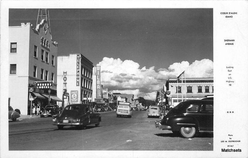 1940s Automobiles  COEUR D ALENE IDAHO Desert Hotel RPPC Autos Woody Wagon