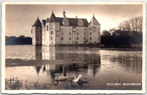 VINTAGE POSTCARD SWAN LAKE AT CASTLE GLUCKSBURG GERMANY REAL PHOTO RPPC 1931