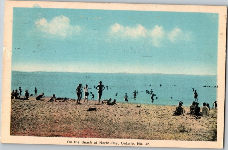 Postcard ON On the Beach at North Bay Lake Nipissing Sunbathers 1941 K67