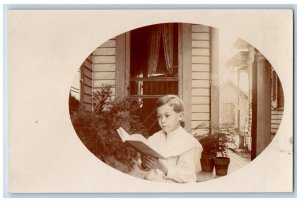 Postcard Little Boy Reading Book on Victorian House c1910 RPPC Photo Posted