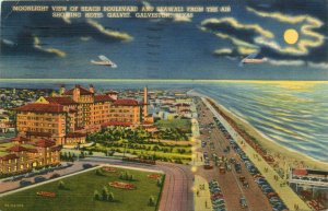 1950 Aerial Moonlight View, Beach Boulevard, Hotel Galvez, Galveston TX Postcard