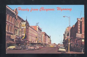 HOWDY FROM CHEYENNE WYOMING DOWNTOWN STREET SCENE 1950;s CARS POSTCARD