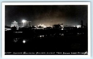 RPPC  SPOKANE, WA  Night BUSINESS DISTRICT from Division Street Bridge Postcard