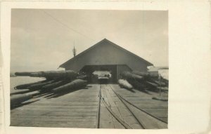 Postcard RPPC C-1910 Logging Lumber Dock Palm Trucks 23-3561