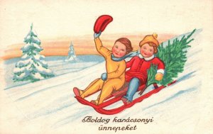 Vintage Postcard 1940  Children Sledding in Snow Boldog Karacsonyi Unnepeket