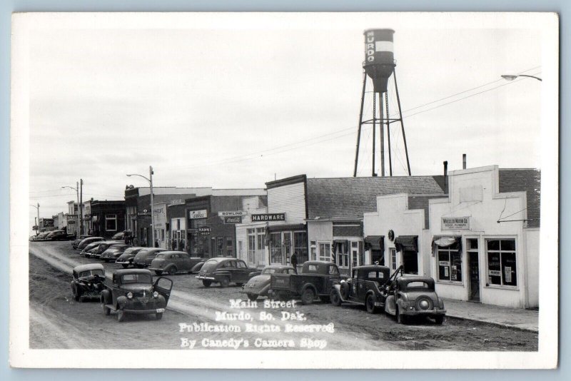 Murdo SD Postcard RPPC Photo Main Street Water Tower Coca Cola Hardware Hamms