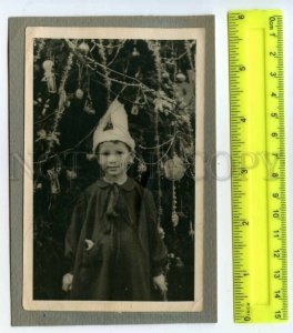 492008 USSR boy in carnival costume at the Christmas tree photo