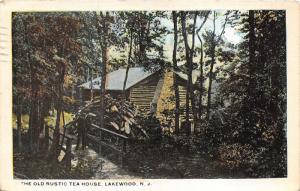 Lakewood New Jersey~Old Rustic Tea House~Man on Bridge~Wood Pile~1923 Postcard