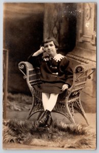 Young Girl in Dress Sitting on Wicker Chair Real Photo Portrait RPPC