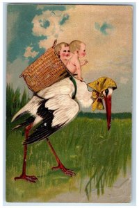 1908 Stork Delivering Twin Babies In Basket Sioux City Iowa IA Embossed Postcard