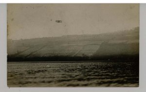 Biplane in Flight ca 1920   RPPC