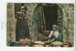 460320 Israel Palestine Jerusalem women baking flatbread Vintage postcard