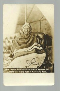 Niobrara NEBRASKA RPPC c1910 SIOUX INDIAN WOMAN 123 Years Old MRS. SULLY Tepee