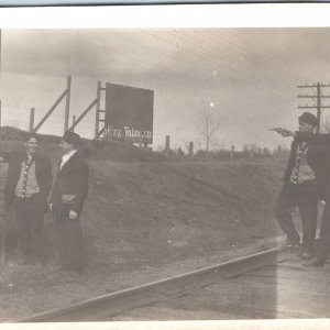 c1900s Man Shoot Gun Pistol RPPC Play Act Scene Mob Hitman Train Track Gang A167