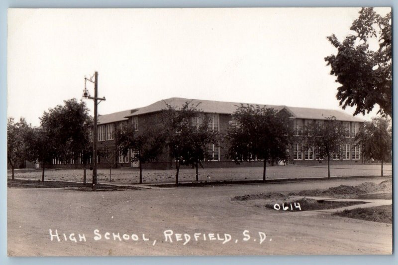 Redfield South Dakota SD Postcard RPPC Photo High School Building Dirt Road