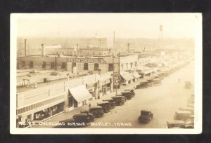 RPPC BURLEY IDAHO DOWNTOWN STREET SCENE OLD CARS STORES REAL PHOTO POSTCARD