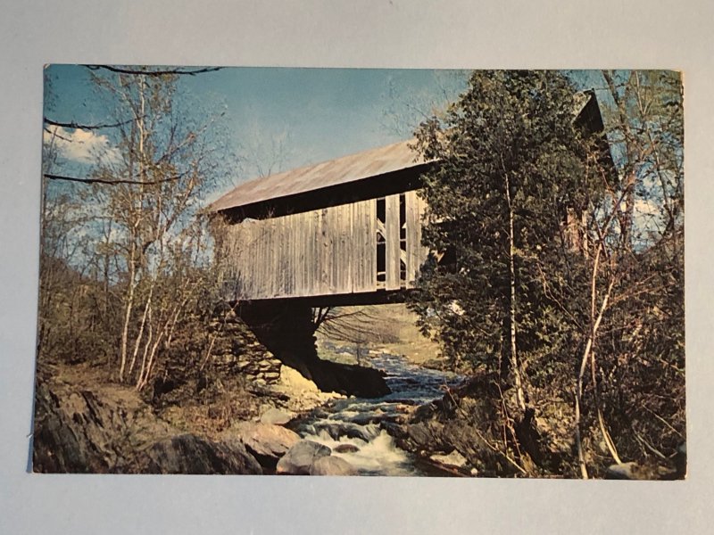 covered bridge in Stowe in the Green Mountains of VT