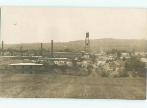 rppc Pre-1920's WIDE VIEW OF HOUSES BESIDE FACTORY PLANT AC7971