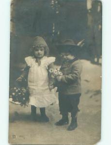 rppc 1907 GIRL CARRYING LITTLE FLOWER BASKET BESIDE BOY AC8222